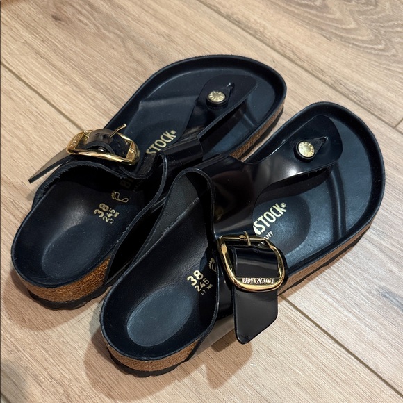 Birkenstock Black Sandals with Gold Accents - Picture 2 of 3